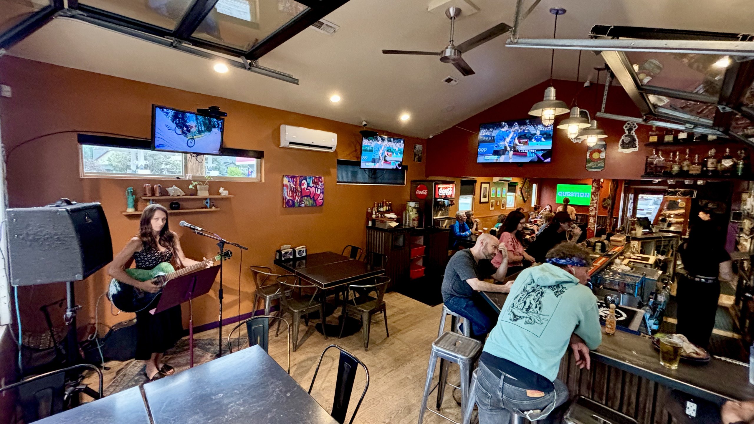 A live music night with guests at HomeSlice Pizza College Drive